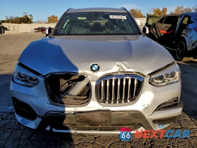 Piąte zdjęcie samochodu w środku: 2021 BMW X3 XDRIVE30E VIN:5UXTS1C09M9H15211 - miniatura