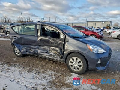 Czwarte zdjęcie samochodu z boku: 2014 TOYOTA PRIUS C VIN:JTDKDTB31E1571486 - miniatura