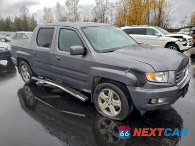 Czwarte zdjęcie samochodu z boku: 2014 HONDA RIDGELINE RTL VIN:5FPYK1F53EB002251 - miniatura