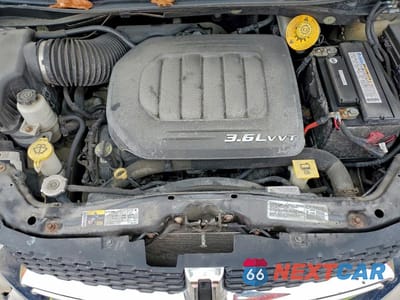 Zdjęcie 12 z 13 samochodu: 2014 DODGE GRAND CARAVAN SE VIN:2C4RDGBG1ER335408 - miniatura