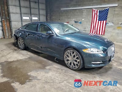Czwarte zdjęcie samochodu z boku: 2013 JAGUAR XJL PORTFOLIO VIN:SAJWJ2GD1D8V45032 - miniatura