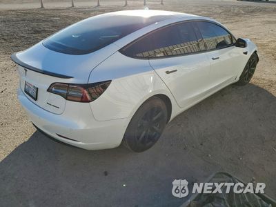 Trzecie zdjęcie samochodu z tyłu: 2022 TESLA MODEL 3 VIN:5YJ3E1EB6NF240354 - miniatura