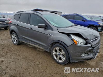Czwarte zdjęcie samochodu z boku: 2014 FORD ESCAPE SE VIN:1FMCU9GXXEUD66374 - miniatura