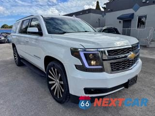 Czwarte zdjęcie samochodu z boku: 2015 CHEVROLET SUBURBAN C1500 LT VIN:1GNSCJKC8FR505342 - miniatura
