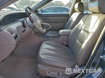 Zdjęcie 7 z 14 samochodu: 2004 TOYOTA AVALON XL VIN:4T1BF28BX4U353574 - miniatura