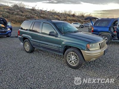 Czwarte zdjęcie samochodu z boku: 2003 JEEP GRAND CHEROKEE LIMITED VIN:1J4GW58NX3C549969 - miniatura
