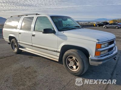 Czwarte zdjęcie samochodu z boku: 1999 CHEVROLET SUBURBAN C2500 VIN:3GNGC26JXXG196818 - miniatura