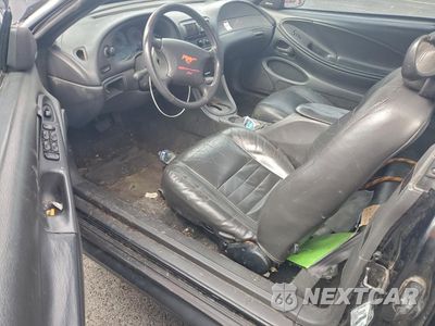 Zdjęcie 8 z 13 samochodu: 1999 FORD MUSTANG GT VIN:1FAFP45X7XF133421 - miniatura