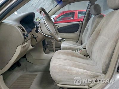 Zdjęcie 7 z 11 samochodu: 2000 TOYOTA COROLLA VE VIN:1NXBR12E5YZ338359 - miniatura