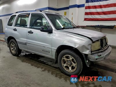 Czwarte zdjęcie samochodu z boku: 2001 CHEVROLET TRACKER VIN:2CNBJ13C016952812 - miniatura