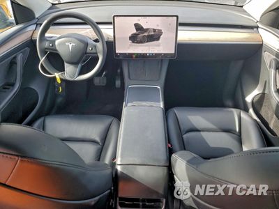Zdjęcie 8 z 14 samochodu: 2023 TESLA MODEL Y VIN:7SAYGDEE5PF816470 - miniatura