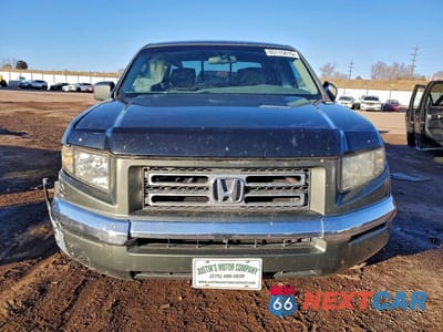 Piąte zdjęcie samochodu w środku: 2006 HONDA RIDGELINE RTS VIN:2HJYK16486H502008 - miniatura