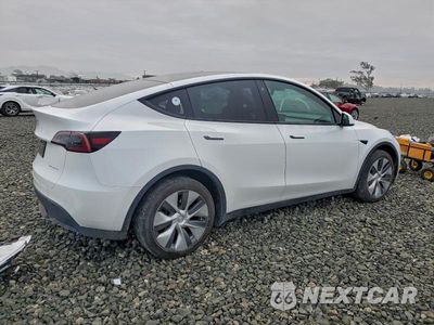 Trzecie zdjęcie samochodu z tyłu: 2023 TESLA MODEL Y VIN:7SAYGDEE5PA035445 - miniatura