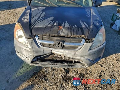 Zdjęcie 12 z 13 samochodu: 2004 HONDA CR-V LX VIN:JHLRD68404C023999 - miniatura