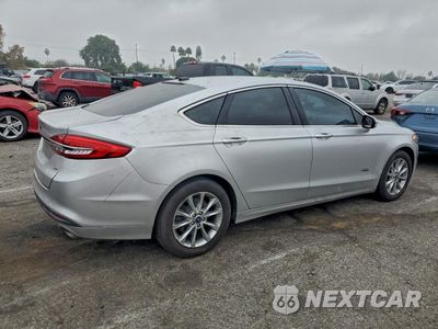 Trzecie zdjęcie samochodu z tyłu: 2017 FORD FUSION SE PHEV VIN:3FA6P0PU3HR264698 - miniatura