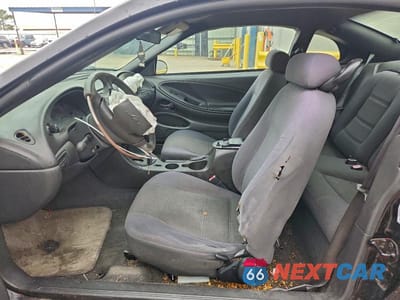 Zdjęcie 7 z 11 samochodu: 2004 FORD MUSTANG VIN:1FAFP406X4F222913 - miniatura