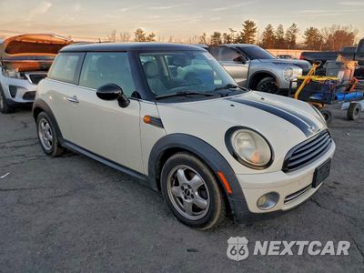 Czwarte zdjęcie samochodu z boku: 2009 MINI COOPER VIN:WMWMF335X9TW76019 - miniatura