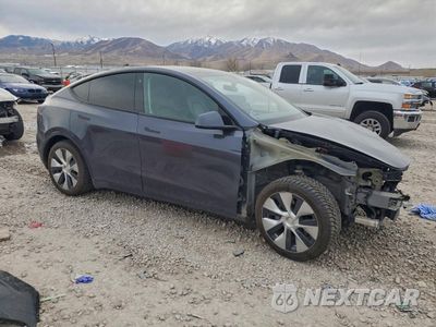 Czwarte zdjęcie samochodu z boku: 2022 TESLA MODEL Y VIN:7SAYGDEE3NF451364 - miniatura