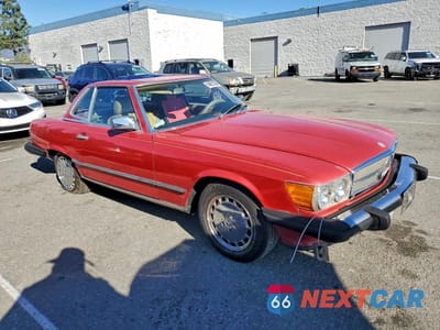 Czwarte zdjęcie samochodu z boku: 1988 MERCEDES-BENZ 560 SL VIN:WDBBA48D9JA080896 - miniatura