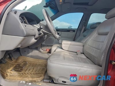 Zdjęcie 7 z 14 samochodu: 1999 LINCOLN TOWN CAR SIGNATURE VIN:1LNHM82W4XY701557 - miniatura