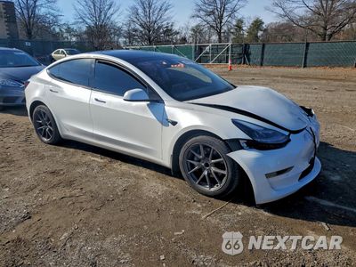 Czwarte zdjęcie samochodu z boku: 2021 TESLA MODEL 3 VIN:5YJ3E1EA1MF059846 - miniatura
