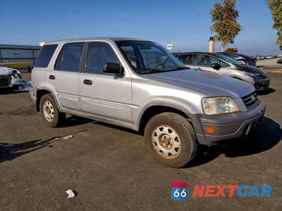 Czwarte zdjęcie samochodu z boku: 1999 HONDA CR-V LX VIN:JHLRD1847XC063777 - miniatura
