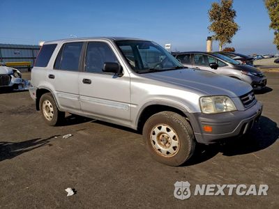 Czwarte zdjęcie samochodu z boku: 1999 HONDA CR-V LX VIN:JHLRD1847XC063777 - miniatura