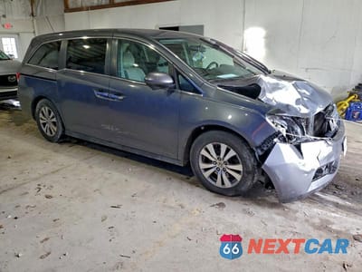 Czwarte zdjęcie samochodu z boku: 2017 HONDA ODYSSEY SE VIN:5FNRL5H31HB020099 - miniatura