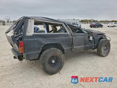 Trzecie zdjęcie samochodu z tyłu: 1992 JEEP CHEROKEE VIN:1J4FJ58S3NL102998 - miniatura