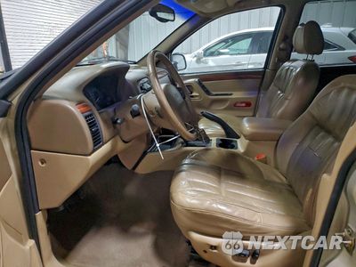 Zdjęcie 7 z 13 samochodu: 1999 JEEP GRAND CHEROKEE LIMITED VIN:1J4GW68N3XC789327 - miniatura