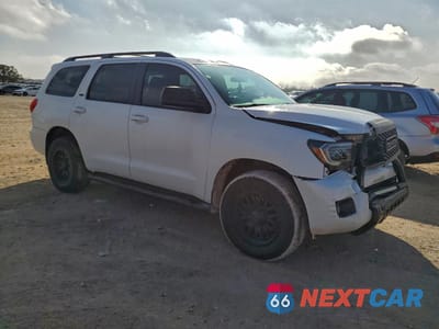 Czwarte zdjęcie samochodu z boku: 2014 TOYOTA SEQUOIA SR5 VIN:5TDBY5G16ES101335 - miniatura