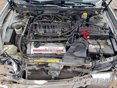 Zdjęcie 11 z 11 samochodu: 2000 NISSAN MAXIMA GLE VIN:JN1CA31D2YT534594 - miniatura