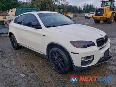Czwarte zdjęcie samochodu z boku: 2014 BMW X6 XDRIVE35I VIN:5UXFG2C59E0H11438 - miniatura