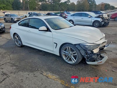 Czwarte zdjęcie samochodu z boku: 2018 BMW 440I VIN:WBA4W7C55JAB87666 - miniatura