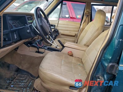Zdjęcie 7 z 12 samochodu: 1996 JEEP CHEROKEE SPORT VIN:1J4FJ68S9TL205829 - miniatura