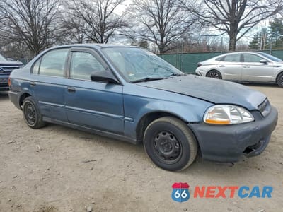 Czwarte zdjęcie samochodu z boku: 1996 HONDA CIVIC DX VIN:1HGEJ6521TL054685 - miniatura