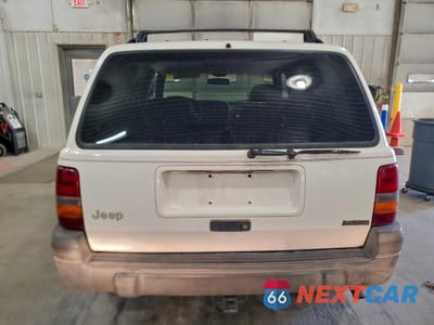Zdjęcie 6 z 14 samochodu: 1996 JEEP GRAND CHEROKEE LAREDO VIN:1J4GZ58S7TC321098 - miniatura