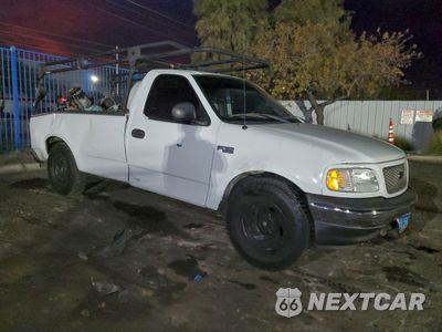 Czwarte zdjęcie samochodu z boku: 2003 FORD F150 VIN:1FTRF17233NB85980 - miniatura