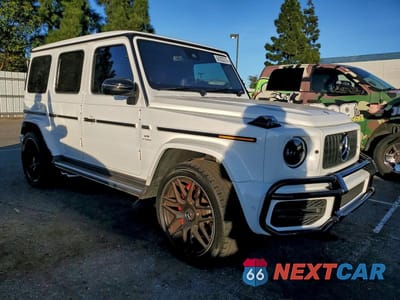 Czwarte zdjęcie samochodu z boku: 2021 MERCEDES-BENZ G 63 AMG VIN:W1NYC7HJ7MX410347 - miniatura