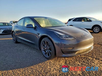Czwarte zdjęcie samochodu z boku: 2021 TESLA MODEL 3 VIN:5YJ3E1EA5MF994223 - miniatura