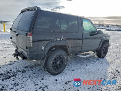 Trzecie zdjęcie samochodu z tyłu: 1995 CHEVROLET TAHOE K1500 VIN:1GNEK18K0SJ300668 - miniatura