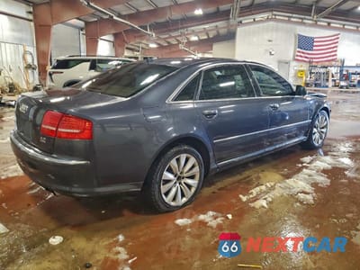 Trzecie zdjęcie samochodu z tyłu: 2010 AUDI A8 QUATTRO VIN:WAURVAFAXAN008543 - miniatura