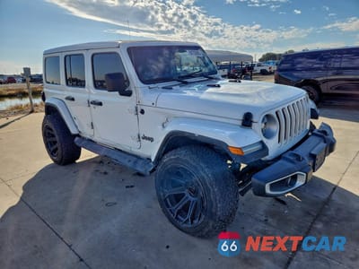 Czwarte zdjęcie samochodu z boku: 2022 JEEP WRANGLER UNLIMITED SAHARA VIN:1C4HJXEN0NW251764 - miniatura