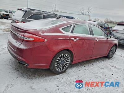 Trzecie zdjęcie samochodu z tyłu: 2017 FORD FUSION TITANIUM VIN:3FA6P0K97HR118288 - miniatura