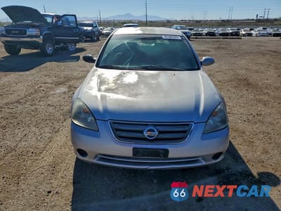 Piąte zdjęcie samochodu w środku: 2003 NISS ALTIMA VIN:1N4AL11D93C233452 - miniatura