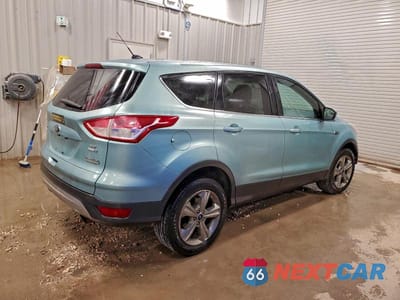 Trzecie zdjęcie samochodu z tyłu: 2013 FORD ESCAPE SE VIN:1FMCU9GX7DUD55587 - miniatura