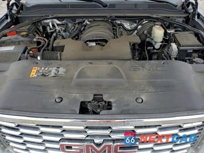 Zdjęcie 12 z 14 samochodu: 2018 GMC YUKON DENALI VIN:1GKS2CKJ3JR268259 - miniatura