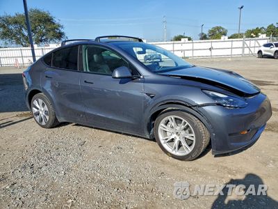 Czwarte zdjęcie samochodu z boku: 2023 TESLA MODEL Y VIN:7SAYGDEE8PA211064 - miniatura
