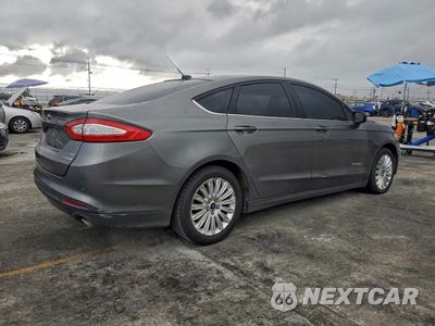 Trzecie zdjęcie samochodu z tyłu: 2013 FORD FUSION SE HYBRID VIN:3FA6P0LU7DR229422 - miniatura
