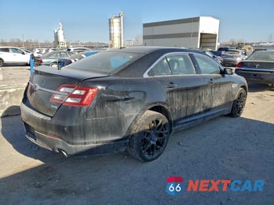 Trzecie zdjęcie samochodu z tyłu: 2014 FORD TAURUS POLICE INTERCEPTOR VIN:1FAHP2MT5EG127765 - miniatura